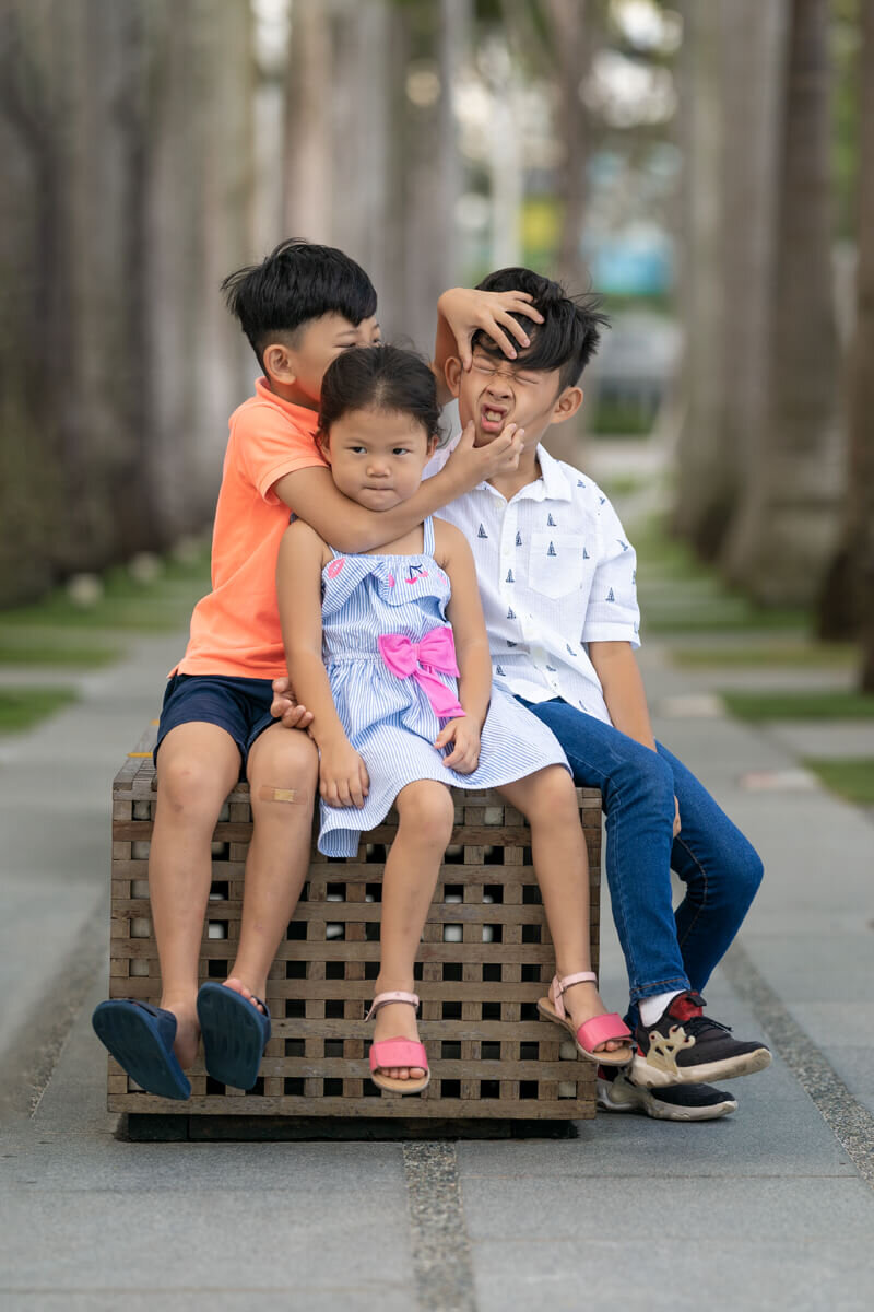 Two children outdoors, by Magicdow Photography Singapore